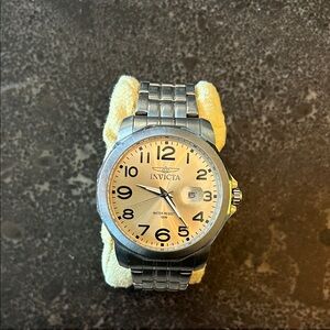 Invicta Two-Tone Silver and Gold Watch.  Would need new battery